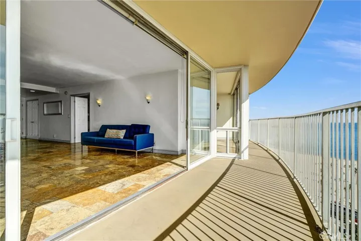 East-facing balcony opening from the living room, offering serene views.