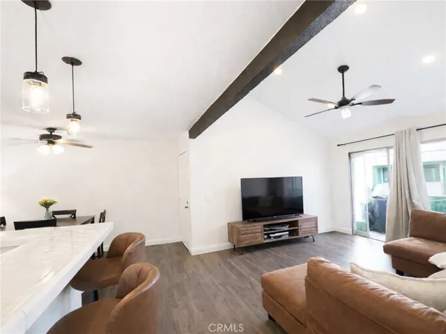Living room with abundant natural lighting.