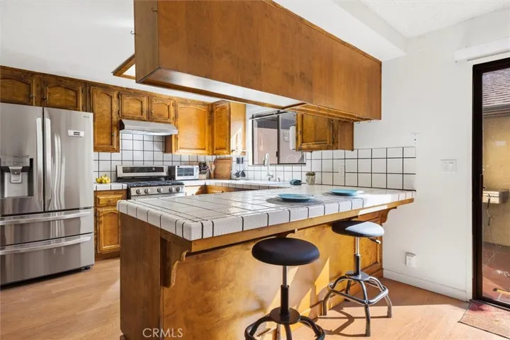 Kitchen with breakfast bar seating area