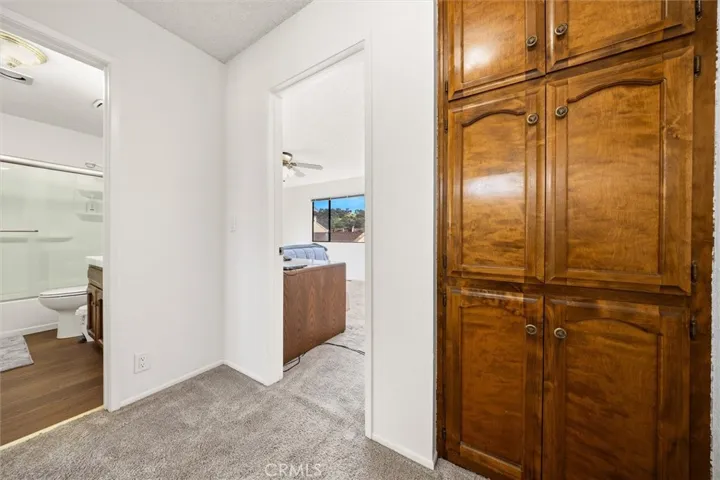 Landing with linen closet, bathroom and bedroom access