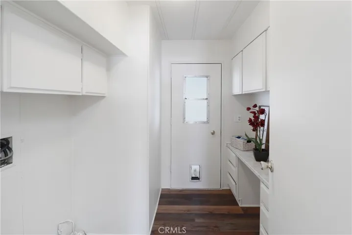 Laundry Room With New Paint and Flooring