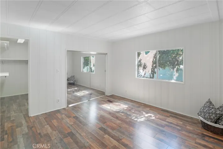 Primary Bedroom With 2 Walk-in Closets & New Paint and Flooring.  Second Walk-in Closet May Not Be Permitted.  Buyer to Verify.