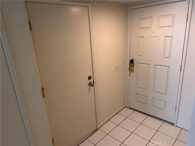 Entry and door to attached garage