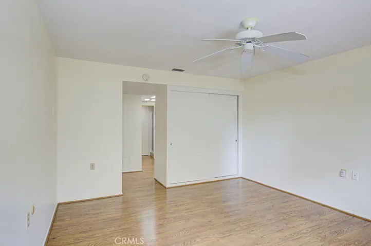 Another view of the primary bedroom suite.