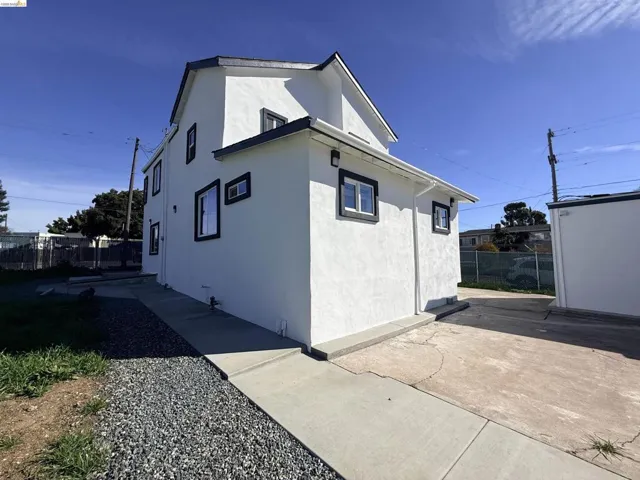 View of property exterior featuring stucco siding