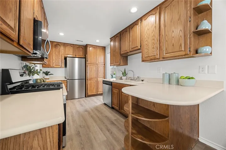 Kitchen view #1 with virtual staged refrigerator.