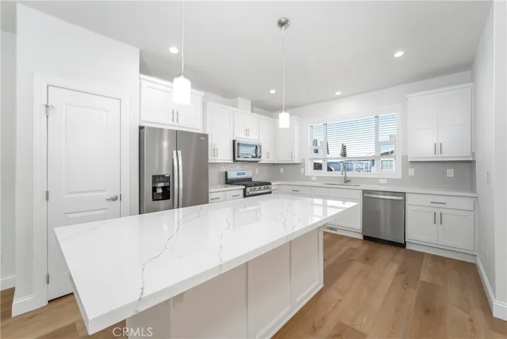 Island kitchen with pantry