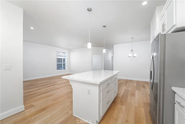 Island kitchen with pantry