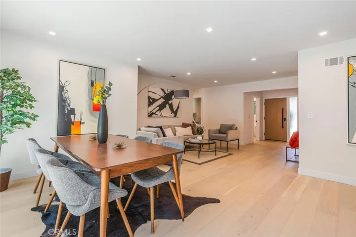 Dining space seamlessly connected to the living room and kitchen.