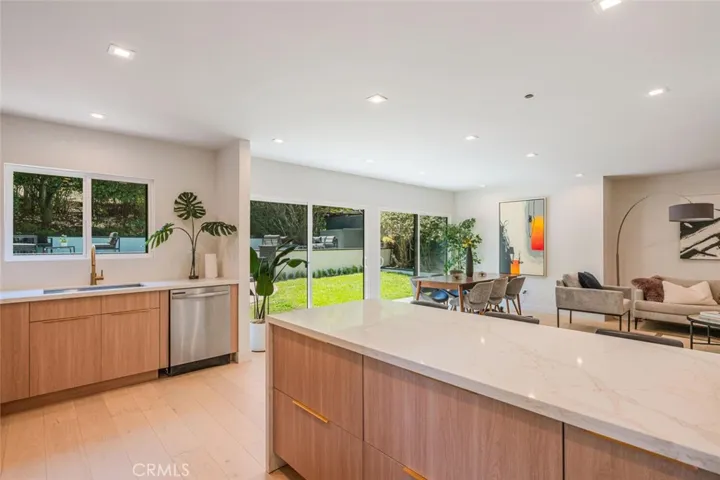 Kitchen overlooking the backyard with abundant natural light.