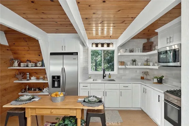 Refrigerator, stove and microwave are virtually staged.