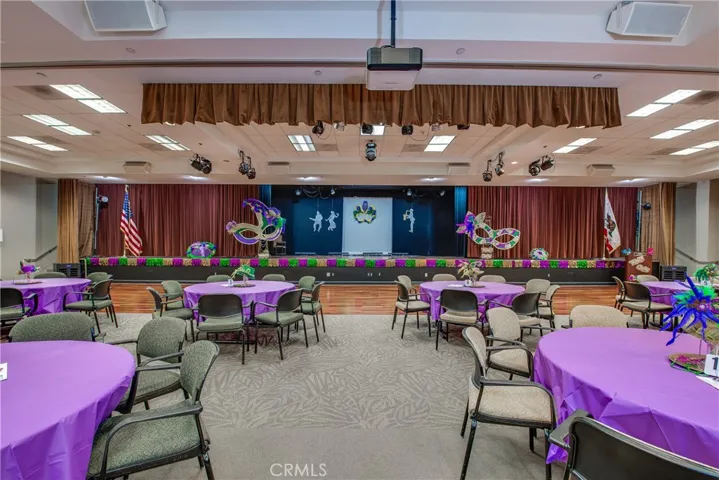 The immense clubhouse has dance floors, indoor and outdoor stages and commercial kitchen.