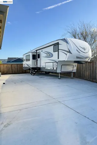 AI Virtually Staged Sideyard with RV