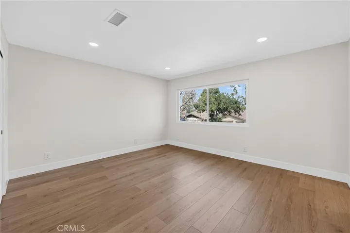 Large Master Bedroom with view to front yard