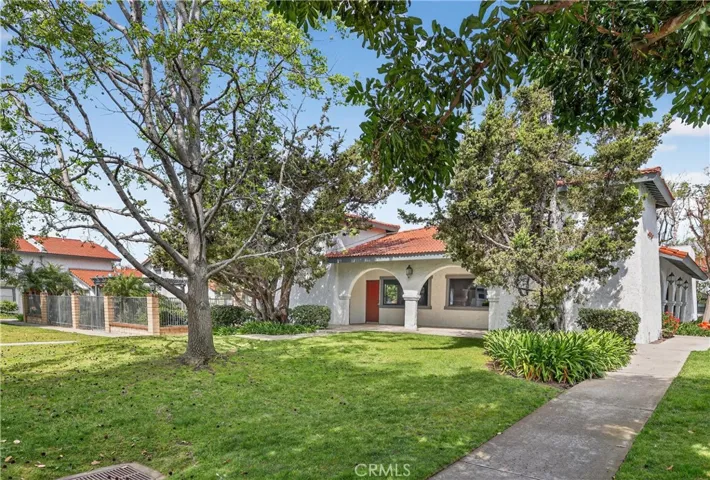 Grassy areas outside the clubhouse and pool area