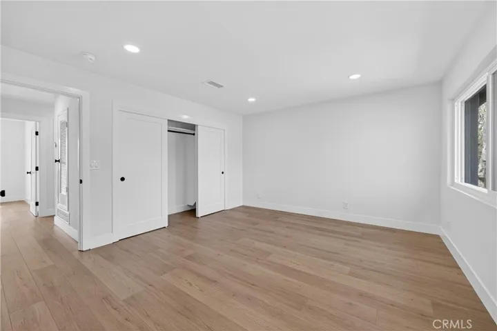 Master bedroom showing closet
