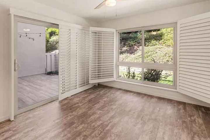 View to back of home and access to fenced in patio.