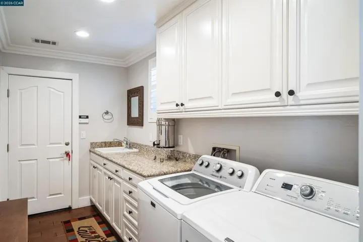Laundry room with sink