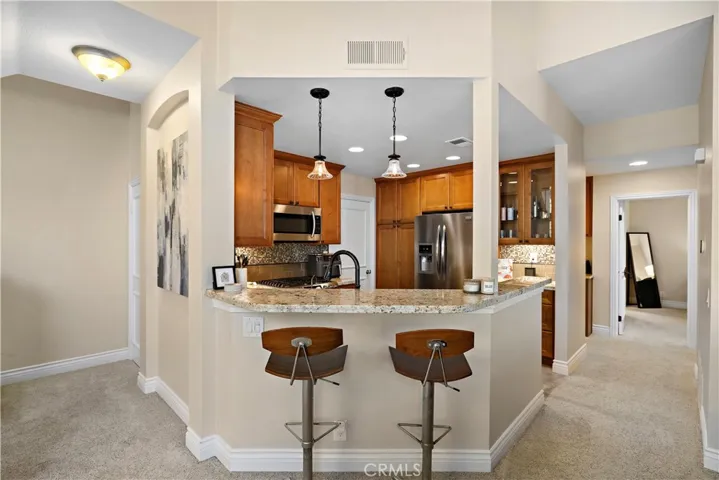Kitchen with bartop seating