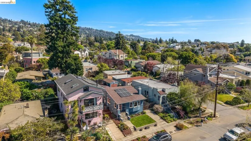 Aerial view of residential area with mountains