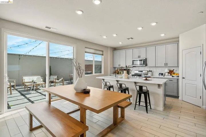 Dining room featuring recessed lighting and light wood-type flooring