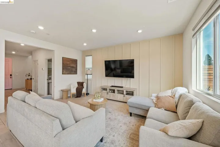 Living room featuring recessed lighting and wood finished floors