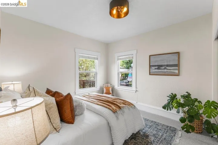 Carpeted bedroom with baseboards