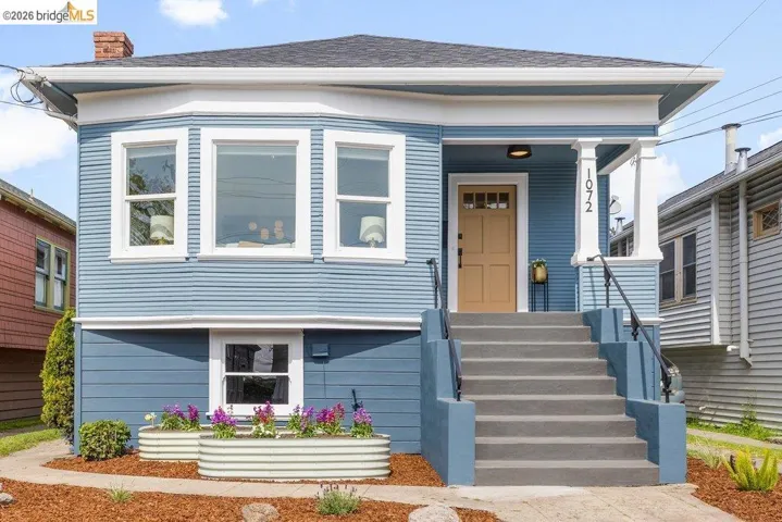 View of front of property with a chimney