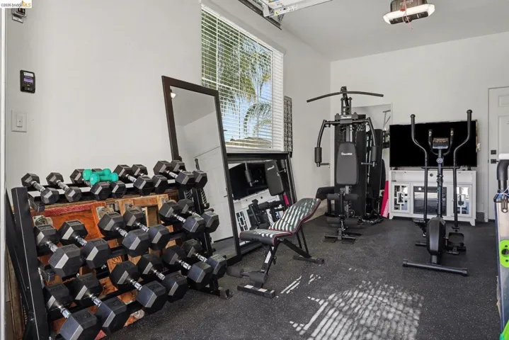 Exercise room with dark rubber floors