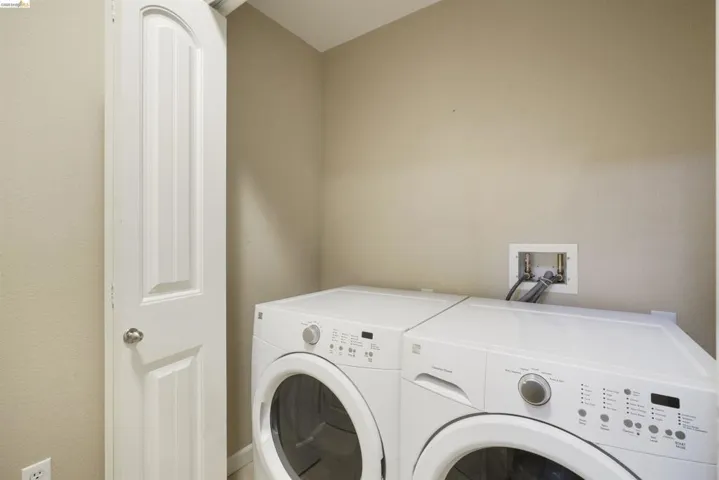 Laundry area with separate washer and dryer