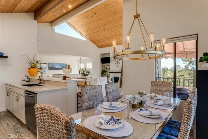 Corner of dining area looking out towards living area.