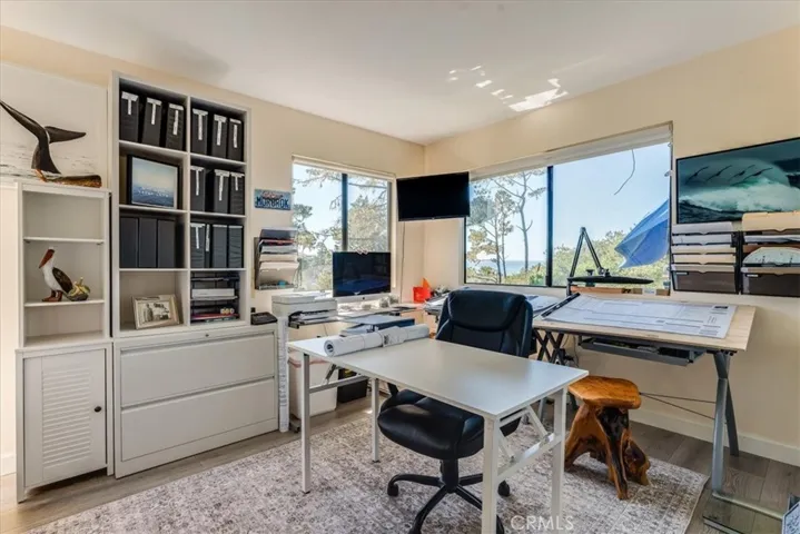 Office/bedroom at bottom of staircase.