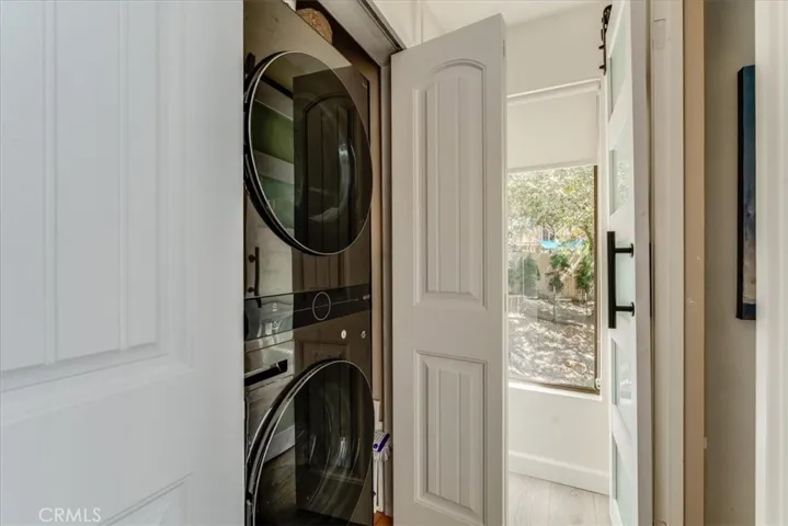 View of washer and dryer in hallway closet.