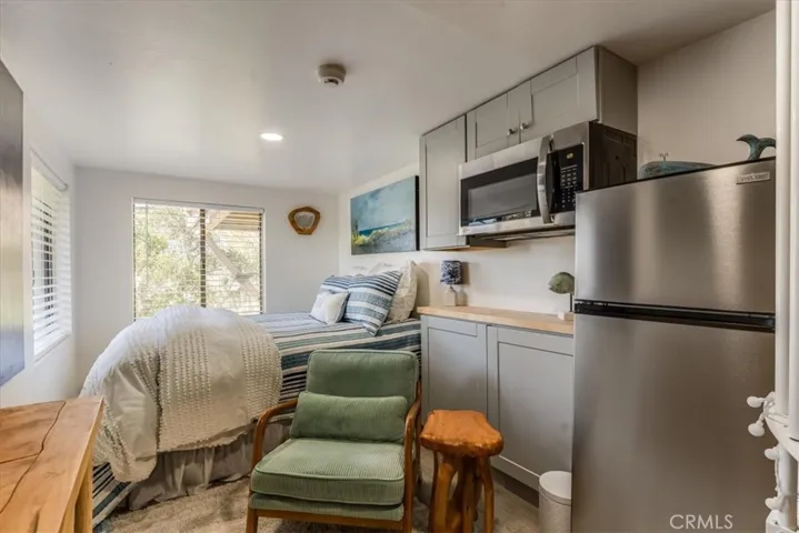 Downstairs room at bottom of spiral staircase (can also access with separate entrance at bottom of house.)