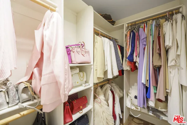 Inside of the closet, on the r
