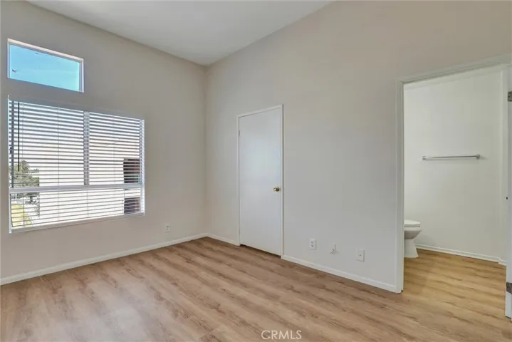 Master bedroom w/ walk-in closet