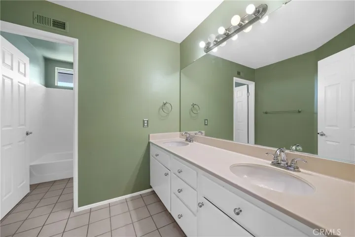 Hall Bathroom With Dual Sinks And Updated Fixtures