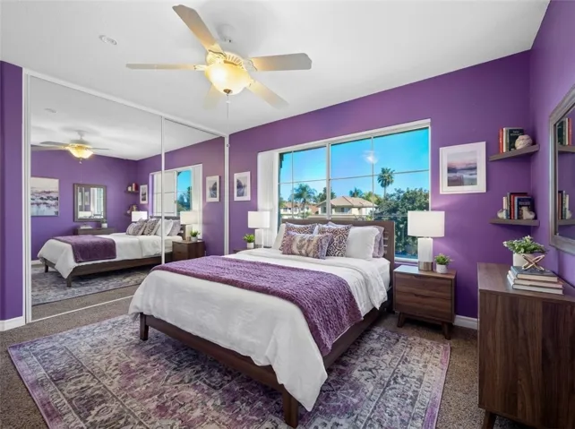 *Digitally Staged. Bright Bedroom Featuring Custom Paint And Ample Natural Light