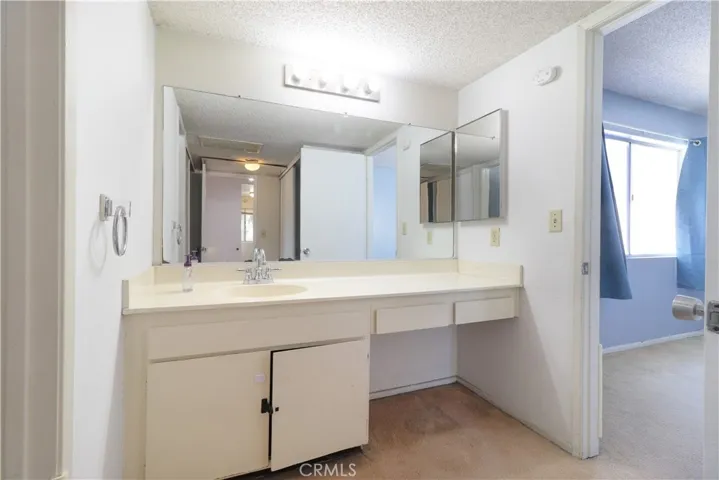 Vanity Area Bedroom Entrance to Right Side