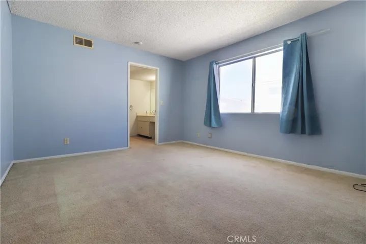 Bedroom with View to Vanity Area