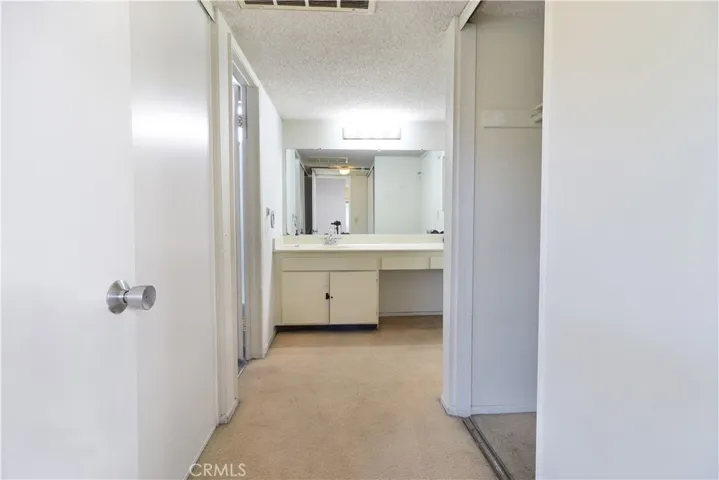 Vanity area with Dual Closets