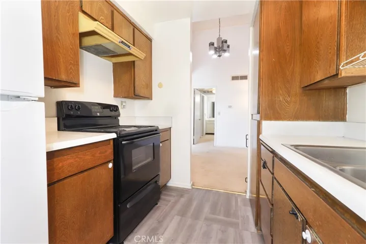 Kitchen view Towards Vanity Area/Bedroom Entry