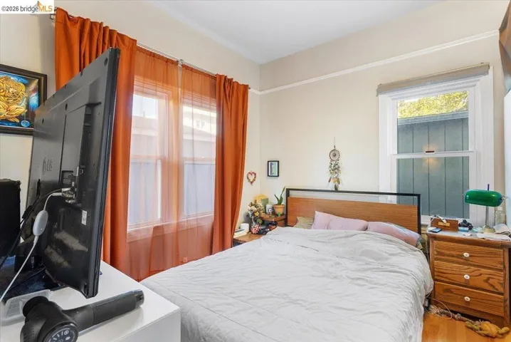 Bedroom with wood finished floors