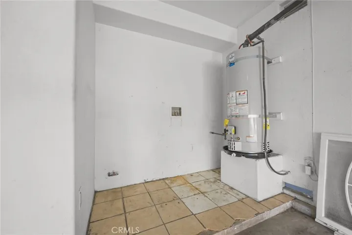 Washer/ dryer area in garage.