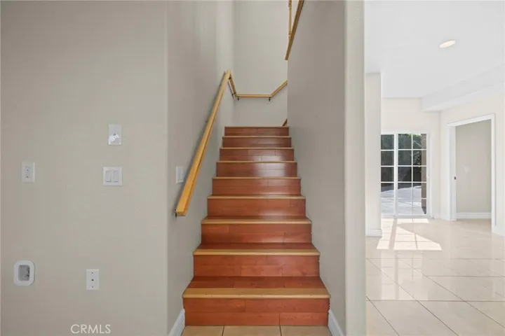 Stairs to private 2nd floor.