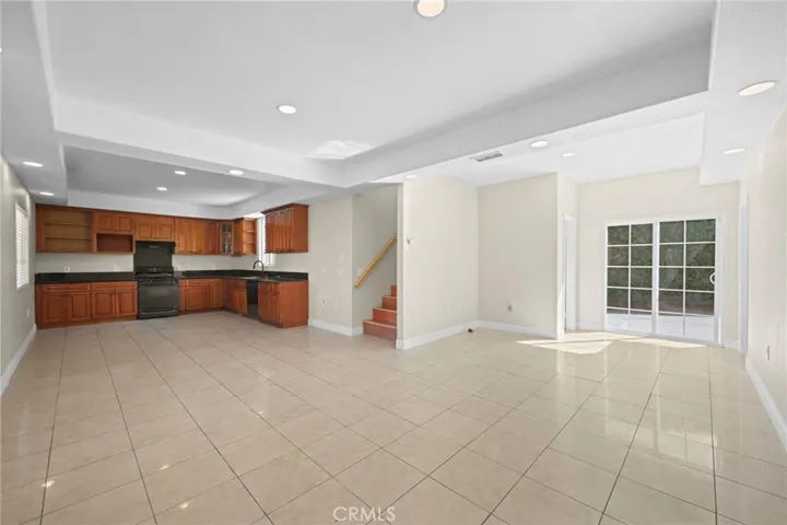 Large L shaped living areas with slider to rear patio.
