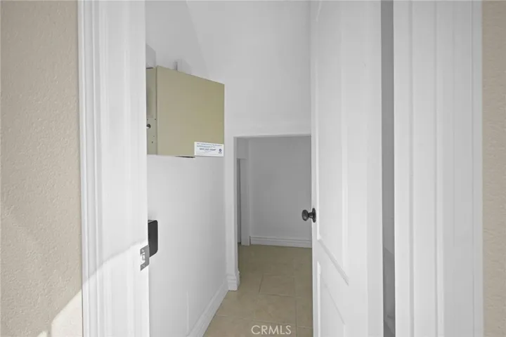 Storage room under stairs.