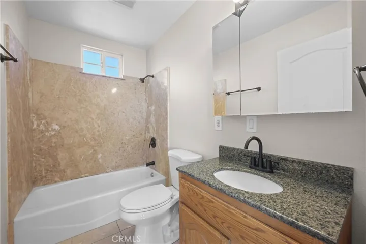 Upstairs hall bath #2.