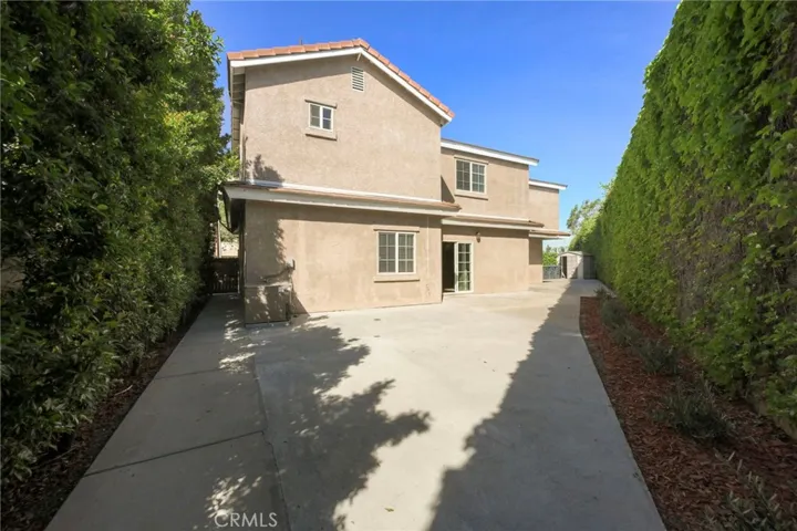 Back of home is very private with a large patio.
