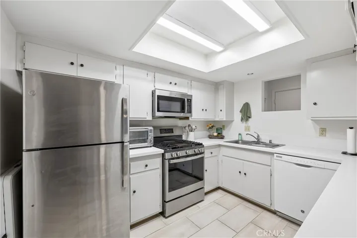 Kitchen offers newer flooring and cabinet paint (2 years ago)